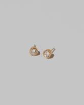 Allium Stud Earrings on light color background.