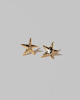 Verve Astral Star Stud Earrings on light color background.