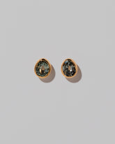 Juniper Studs on light color background.