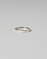Platinum 3mm Etched Leaf Band on light color background.