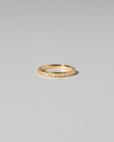 Gold 3mm Etched Leaf Band on light color background.