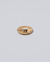 Gold Cognac Diamond Brilliant Cuts Light Cutter Band on light color background.
