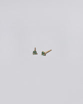 Tourmaline Stud Earrings on light color background.