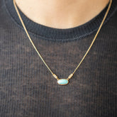 product_details::Thar Necklace on model.