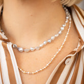 product_details::Ula Pearl Necklace 007 and Ula Pearl Necklace 001 on model.