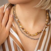 product_details::Ula Pearl Necklace 006 and Ula Pearl Necklace 002 on model.