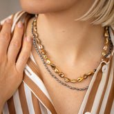 product_details::Ula Pearl Necklace 006 and Ula Pearl Necklace 002 on model.