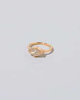 View from the side of the Eupheme Ring on light color background.