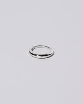 Platinum 3.5mm Venus Band on light color background.