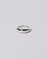 Platinum 5.5mm Venus Band on light color background.