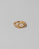 View from the side of the Encircle Ring on light color background.