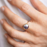 product_details::Gold Albert Rings on model.