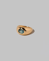 View from the side of the Teal Sapphire Jupiter Ring on light color background.