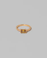Brown Diamond Courtship Ring on light color background.