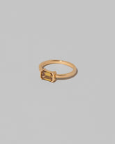 View from the side of the Brown Diamond Courtship Ring on light color background.