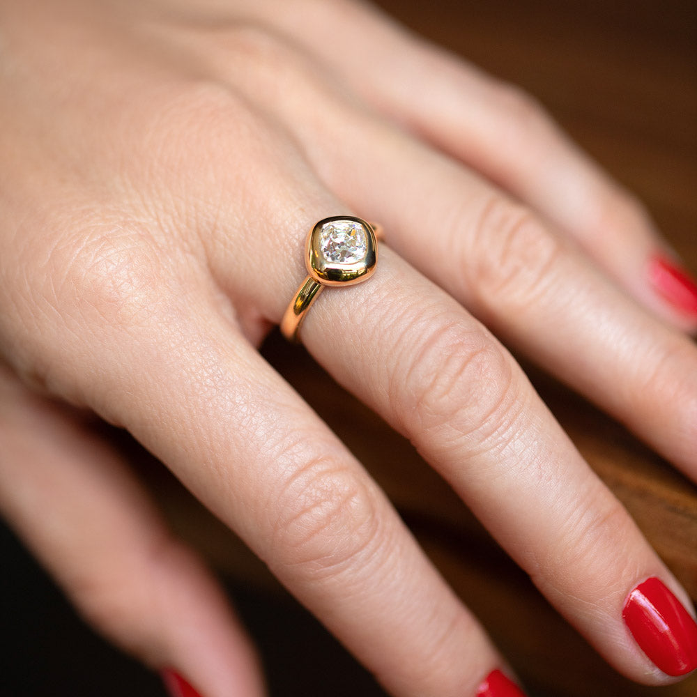 product_details::Diamond Poise Ring on model.