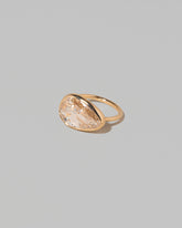 View from the side of the Gusher Diamond Ring 009 on light color background.