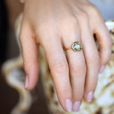 product_details::Gusher Green Sapphire Ring 052 on model.