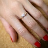 product_details::A past version of the Moval Diamond Transformation Ring on model.