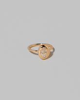 View from the side of the Oval Diamond Precise Ring on light color background.