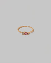 Pink Tourmaline Teardrops Ring on light color background.