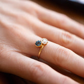 product_details::Sapphire & Diamond Sun & Moon Union Ring on model.