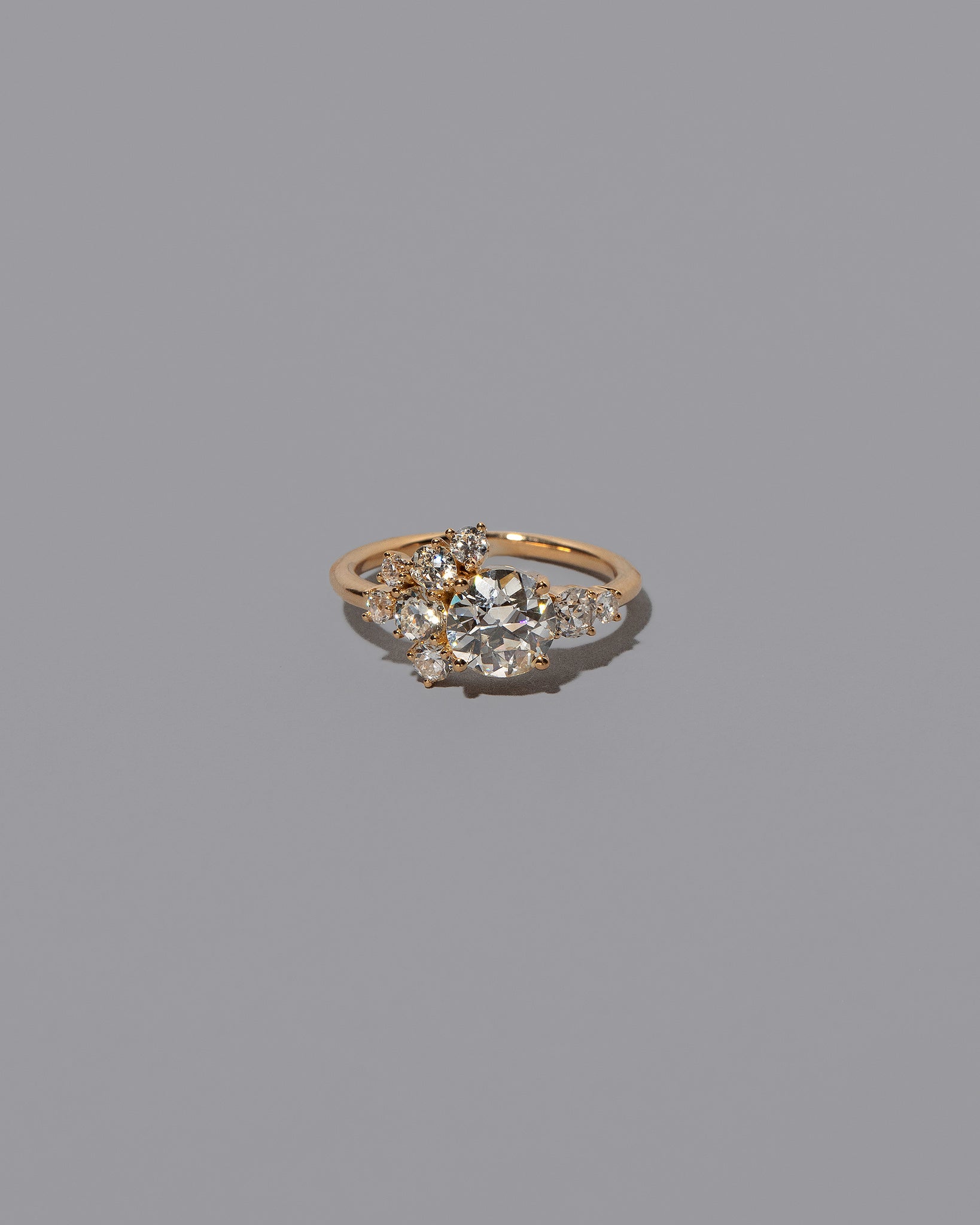 Mega White Diamond Vega Ring on light color background.