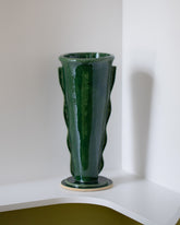 Morgan Peck Glassy Green Scallop Vase on light color background.