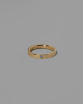Gold Yogo Mine Cornflower Blue Sapphire 4mm Square Cut Piet Band on light color background.