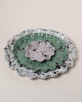 Closeup details of the Recreation Center Ruffle Platter Set on light color background.