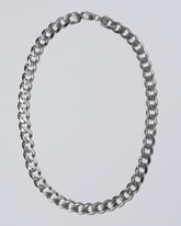 Silver Diamond Curb Chain on light color background.