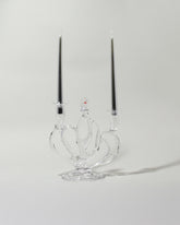 Detail view of the Silje Lindrup Four Glass Candelabra on light color background. Tapers not included.
