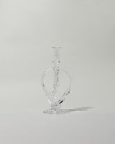 Silje Lindrup Four Glass Candle Holder on light color background.