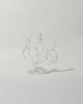 Silje Lindrup Four Glass Candelabra on light color background.