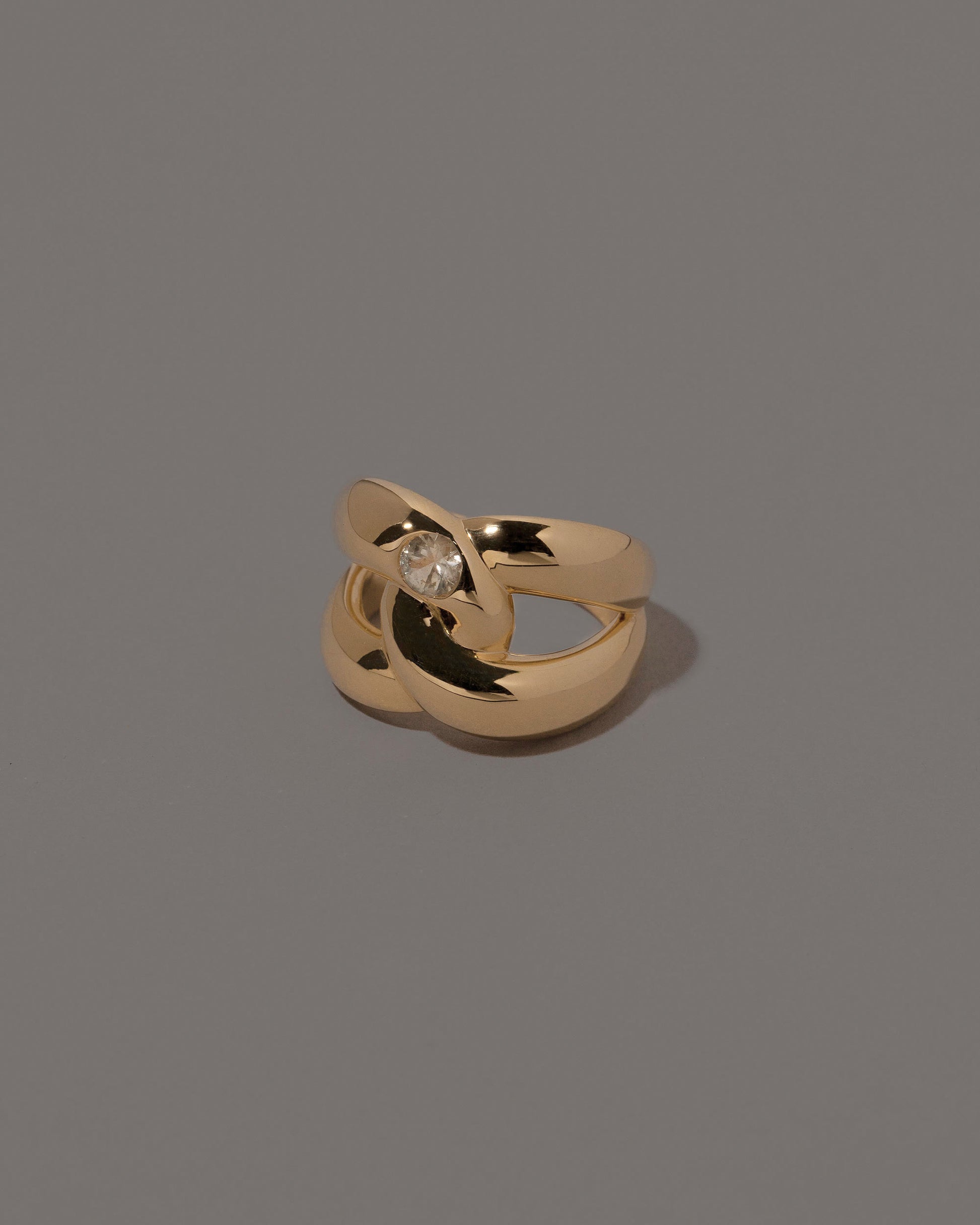 View from the side of the One Ring on grey color background.