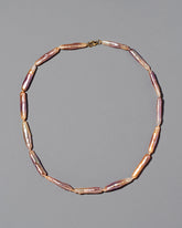 Blush Stick Pearl Strand Necklace on grey color background.