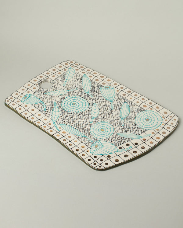 Suzanne Sullivan Two Board on light color background.