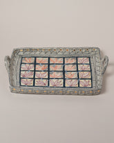 Closeup details of the Suzanne Sullivan Reminder Of Our Pilgrimage Tray on light color background.