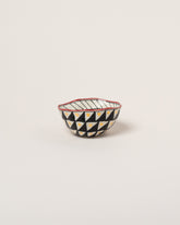 Suzanne Sullivan Two Full Of Deepest Meaning Small Bowl on light color background.