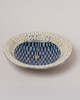 Closeup details of the Suzanne Sullivan High Living And Honesty Footed Bowl on light color background.