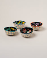 Suzanne Sullivan Zodiac Sign Small Bowls on light color background.