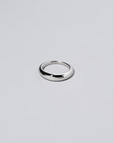 Platinum 4.5mm Venus Band on light color background.