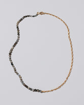 Tahitian Pearl Small Oval Necklace on light color background.