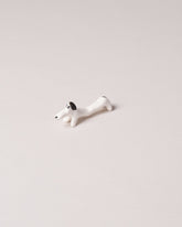 Eleonor Boström Black Chopstick Dog Rest on light color background.