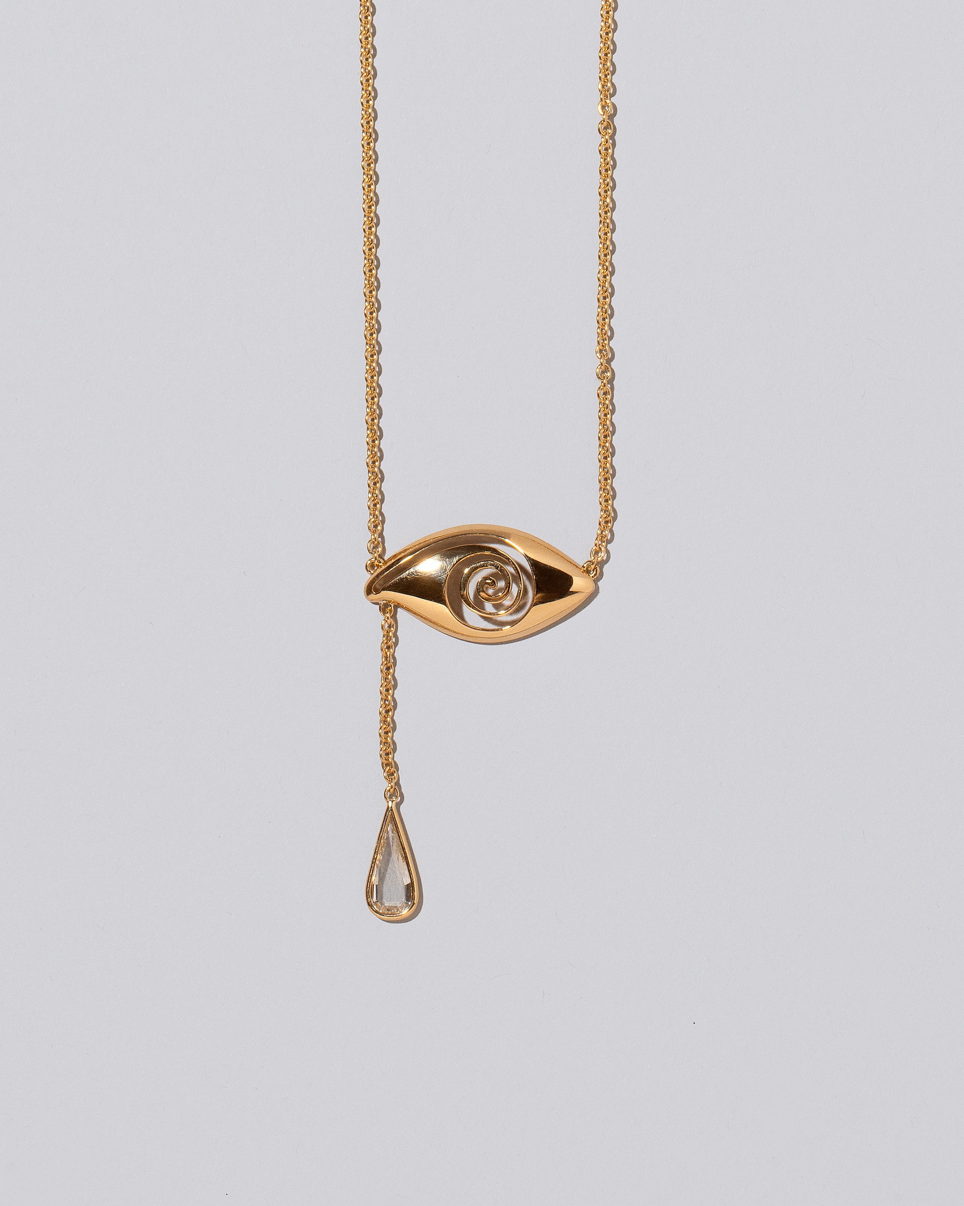 Closeup detail of the Diamond State Shifter Necklace on light color background.