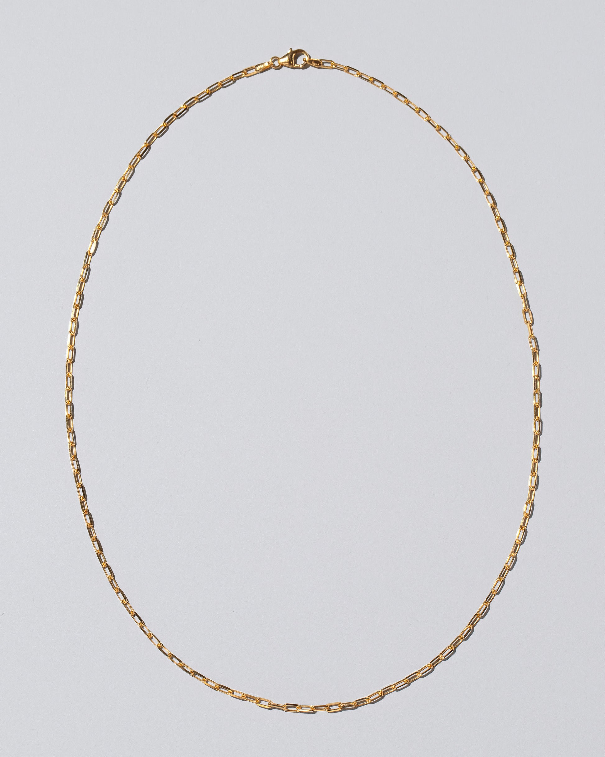 3mm Lightweight Beveled Oval Chain Necklace on light color background.