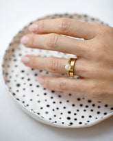 Diamond Calatrava Ring and Gold Diamond North South 4mm Baguette-Set Piet Band on model.