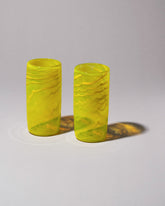 Group of Sirius Glassworks Pure Sunshine Tumblers on on light color background.