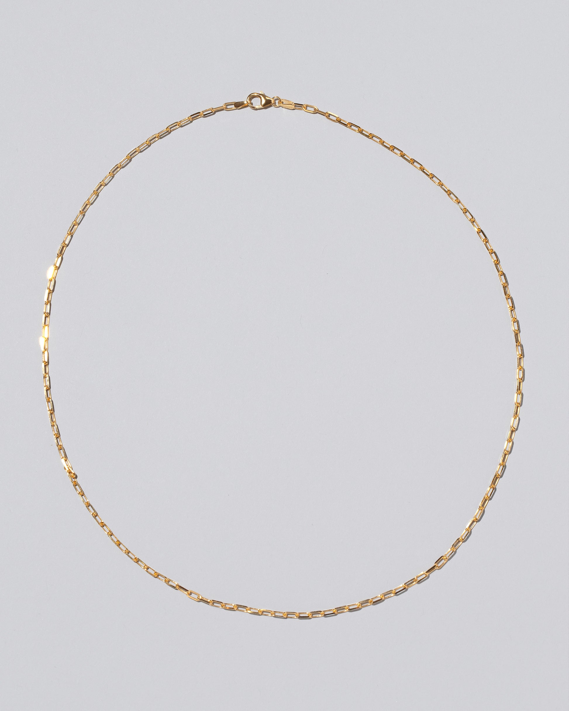 2.2mm Beveled Oval Chain Necklace on light color background.