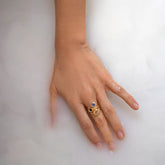 product_details::Styled image featuring the Blue Sapphire Level Ring, Green Sapphire Level Ring and Bicolor Sapphire Grand Align Rings.